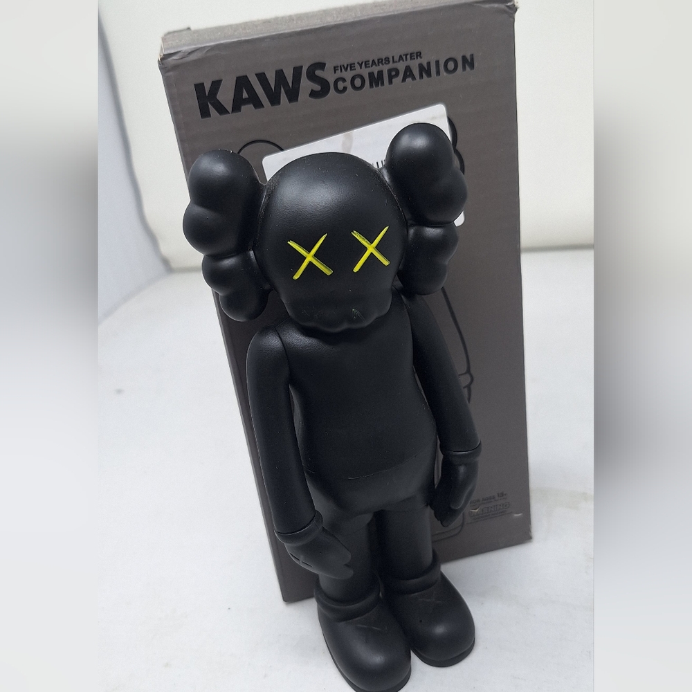 KAWS Companion Figure in Black with Yellow Accents